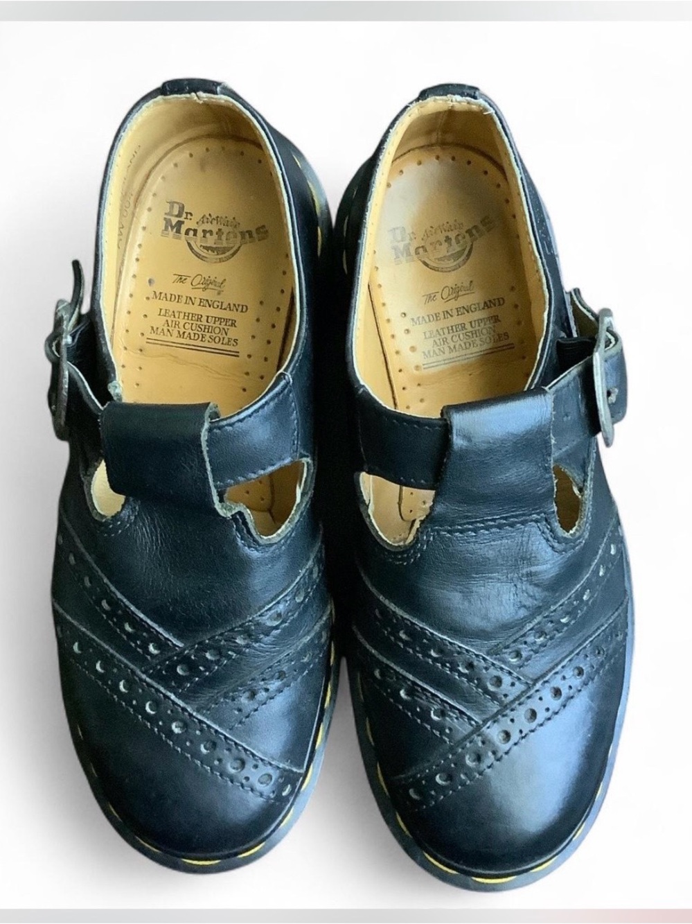 Classic Dr. Martens Mary Jane shoes in sleek black leather 🖤